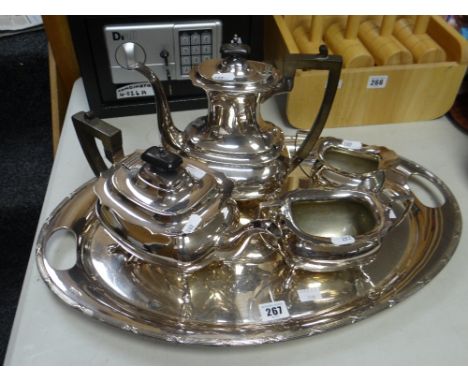 A Walker &amp; Hall electroplate four-piece tea service together with non-associated twin-handled EPNS tray Condition reports