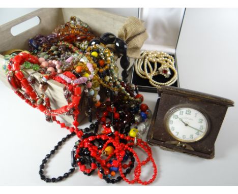 Box of costume jewellery and vintage travel clock Condition reports provided on request by email for this auction otherwise i