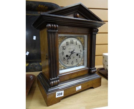 An architectural mahogany mantel clock retailed by Freemans &amp; Sons, Merthyr with gilt decoration to face Condition report