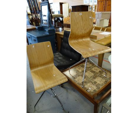 A pair of modern bent-wood chairs on chrome supports and a retro mosaic tile coffee table Condition reports provided on reque