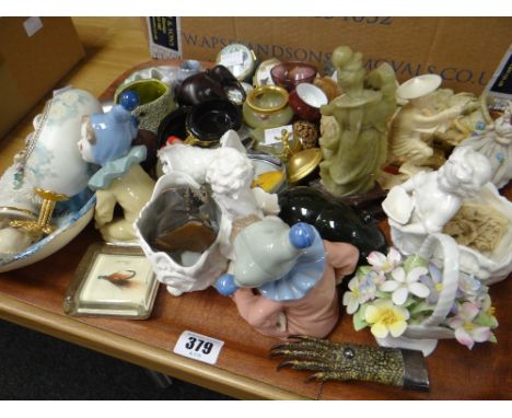 A tray of mixed small collectables including soapstone, reproduction patch-boxes, Nao clown, lizard claw brooch ETC Condition