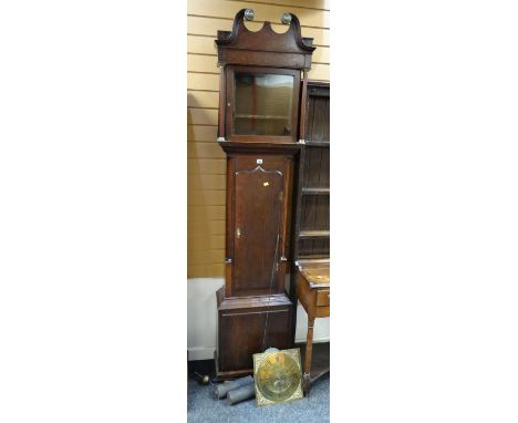 A nineteenth century brass-dial eight-day longcase clock bearing Roman numerals having filigree spangrels, the hood with brok