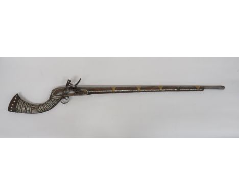 Mid 19th Century Indian Jezail Flintlock Musket 25 bore, 37 3/4 inch barrel.  The breech with scroll edged panel.  Rear peeph