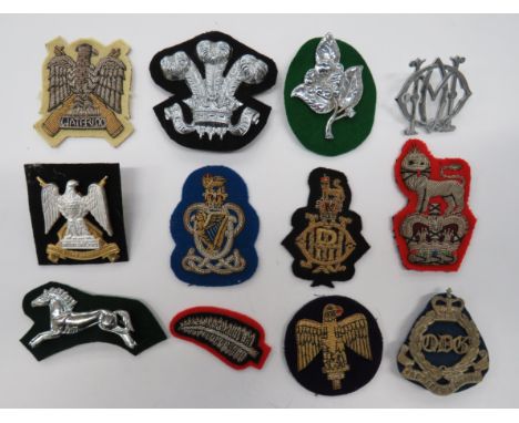 Selection of Current Cavalry and Yeomanry Arm Badges including QC white metal Queens Dragoon Guards ... Bullion embroidery Sc