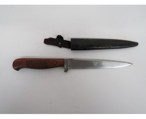 Imperial German Combat Trench Knife 6 inch, single edged blade marked with maker “F.W. Backhaus. Ohligs-Solingen”. Small, ste