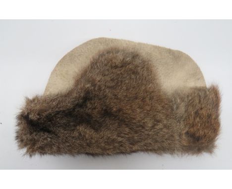 WW1/Interwar Cold Weather Hat white crown.  Fur peak and fold down ear and neck flaps.  Black quilted lining with faint “WD” 