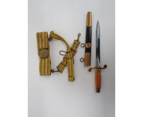 Post War Russian Army Officer’s Dagger and Belt 8 1/4 inch, double edged, polished blade.  The forte with maker’s stamp.  Gil