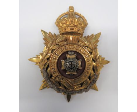 Post 1901 Royal Sussex Regiment Officer’s Helmet Plate gilt, Kings crown backing star.  Gilt, overlaid laurel wreath with ins