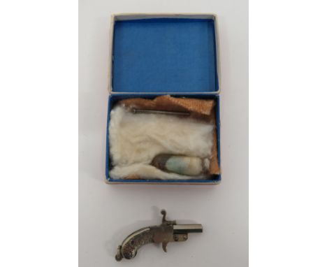 Miniature Pinfire Pistol Watch Fob white metal, octagonal barrel.  White metal body with central hammer and lower trigger.  F