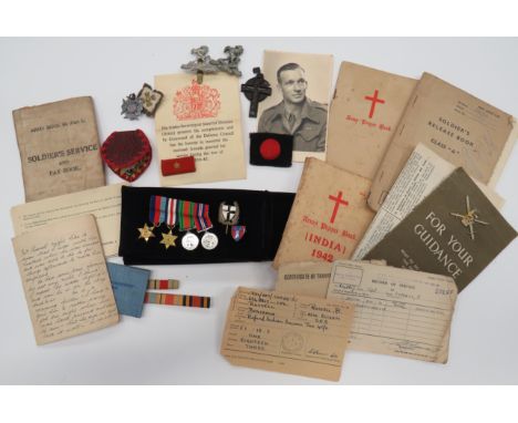 WW2 Medal and Ephemera Collection consisting ephemera to Cpl B Russell including Soldier’s Service book ... Soldier’s Release