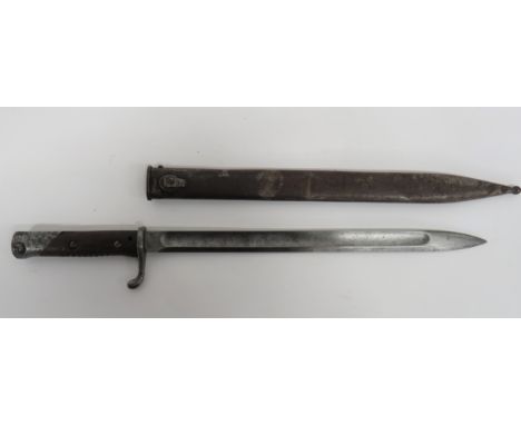 German Contract Export Machine Gunner’s Bayonet 14 1/2 inch, single edged blade.  Wide fuller.  The forte stamped “D.B.I.” an