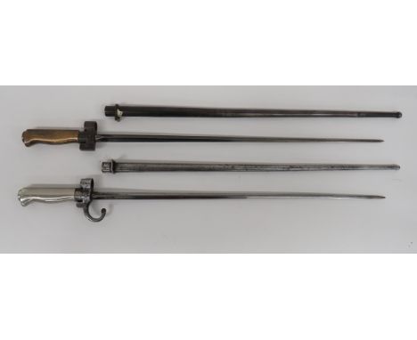 Two French Lebel Bayonets consisting a M1886 example.  20 1/2 inch, cruciform blade.  Steel hook quillon and muzzle ring.  Ro