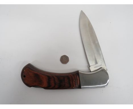 Modern Shop Display Penknife 7 1/4 inch x 2 inch wide, single edged blade.  The forte marked “Crosscut”.  Large, polished ste