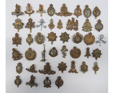 Good Selection of Corps Cap Badges including brass KC APC ... Brass KC Intelligence Corps ... Bi-metal AVC ... Brass KC ASC .
