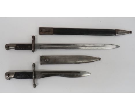 Two Spanish Bayonets consisting M1893 example.  15 1/2 inch, single edged blade with wide fuller.  The forte etched “Artiller