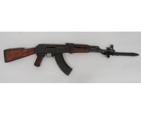 Deactivated Korean AK47 Type 58 Assault Rifle and Bayonet 7.62 mm, 16 1/2 inch, blackened barrel. Front tail sight. Tubular g