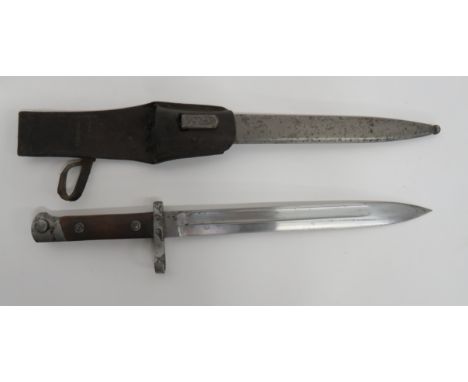 WW1 Period German Made Austrian M1895 Mannlicher Bayonet 9 3/4 inch, single edge blade with wide fuller.  Forte with maker “E