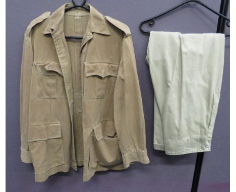 WW2 Bush Shirt and Trousers khaki drill, single breasted tunic.  Pleated chest pockets with buttoned flaps.  Lower bag pocket