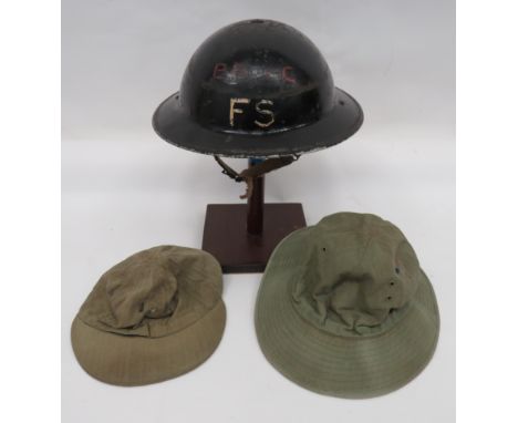 1939 Dated Civil Defence Steel Helmet black painted crown.  The front with red painted “B.R &amp; MC” over white painted “F.S