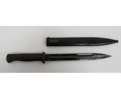 WW2 German K98 Mauser Bayonet 10 inch, single edged, blued blade with wide fuller.  The forte marked “Berg &amp; Co”.  Back e