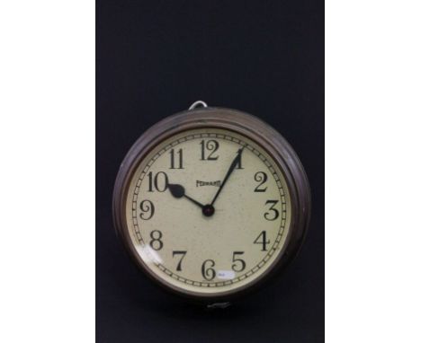 A Ferranti wall clock with brass surround 