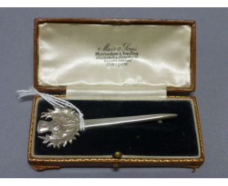 Scottish silver brooch, with a thistle finial, stamped "Sterling", in a fitted red leather case retailed by Muir & Sons, Glas