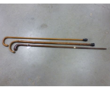 Malacca Walking Stick, Turned Wood Walking Stick and another Walking Stick
