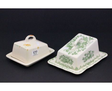 Two ceramic cheese dishes