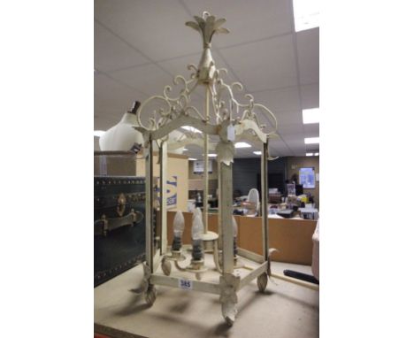 A large painted hanging light 