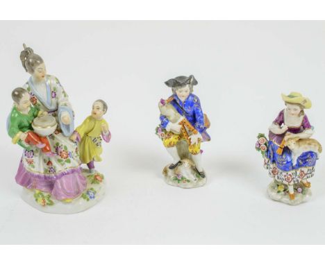 CHELSEA PORCELAIN BAGPIPE BOY AND GIRL WITH LAMB, late 18th century gold ancor period, along with a late 20th century Meissen