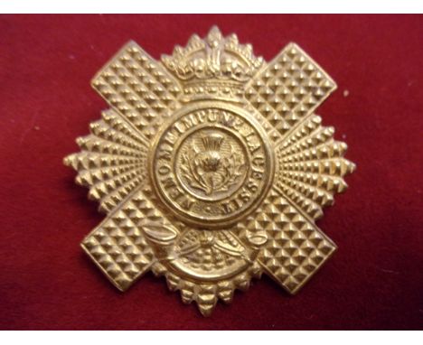 Royal Scots (Lothian Regiment) 4th and 5th Battalions (Queen's Edinburgh Rifles) WWI Economy Cap Badge (Brass), two lugs. K&a