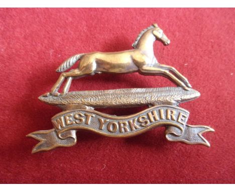 The Prince of Wales's Own (West Yorkshire Regiment) WWII Cap Badge (White-metal), slider. K&amp;K: 608-The Prince of Wales's 
