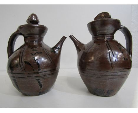 STUDIO POTTERY, pair of Wenford Bridge tenmoku glazed lidded coffee pots, maker JH, the mark is that of Jane Herold, - Michea