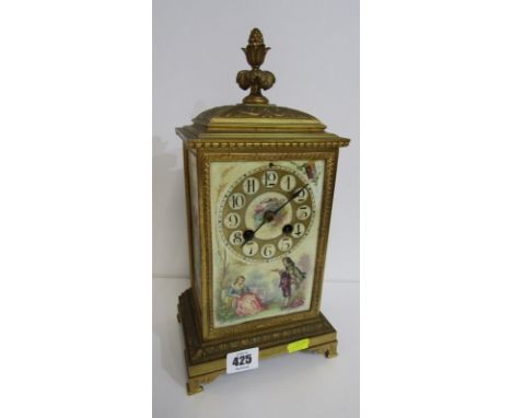 19th CENTURY FRENCH MANTLE CLOCK, inset with porcelain panels decorated with courting couple, in gilded metal casing, 31cm he