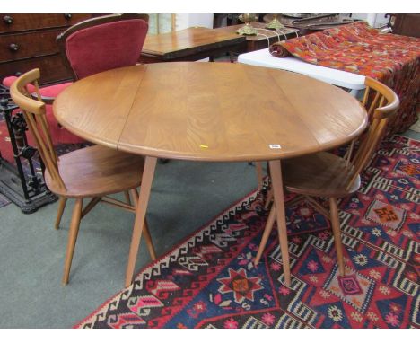 ERCOL, Mid Century light elm Windsor 384 drop leaf table 114cms diameter, also 2 Ercol Windsor 376 candlestick lattice chairs