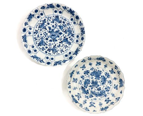 Floral decor, Kangxi Mark and Period, plates measure 19 cm. and 21 cm. in diameter, chip.
