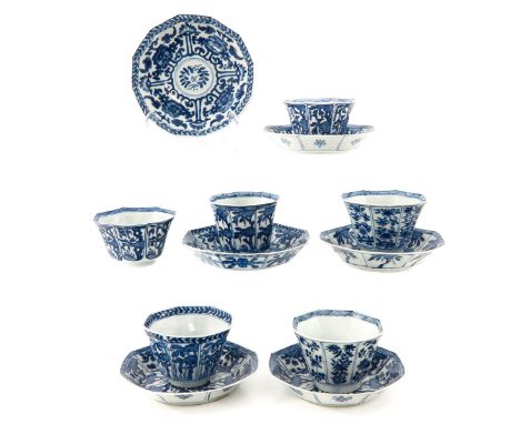 Including 6 cups and 6 saucers, decorated with flowers, saucers marked with double ring and conch shell 13 cm. in diameter, c