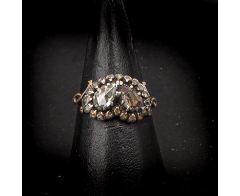 Set with rose cut diamonds, largest diamond is approximately 4 x 5 mm., ring size 18.
