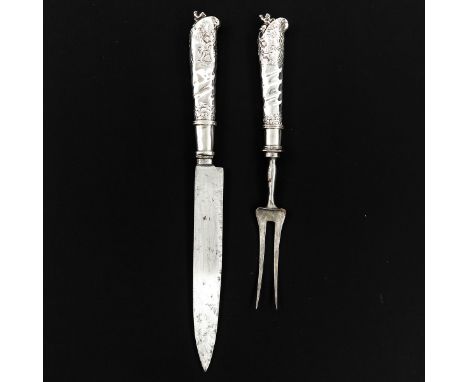 Including meat fork and knife, with silver handle, 18th - 19th Century, Amsterdam mark, 31 cm. long.