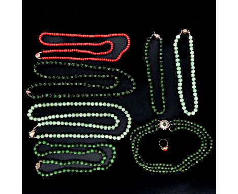 Including 6 jade necklaces, red coral necklace 6 mm. in diameter, and 14KG ring set with Carnelian, ring size 17.