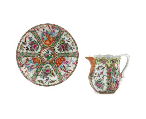 Decorated with flowers, birds, butterflies, and Chinese figures, pitcher is 16 cm. tall, plate is 26 cm. in diameter, chip.