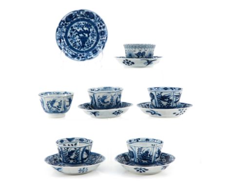 Decorated with sea creatures, saucers are 13 cm. in diameter, chip and hairline.