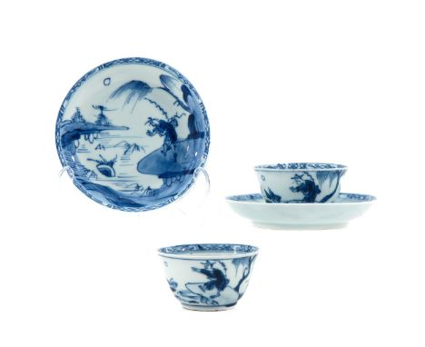 Depicting Chinese figures in landscape, saucers are 12 cm. in diameter, chip and small hairline.