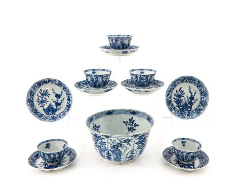 13 pieces, including bowl and cups and saucers in a blue and white decors, bowl measures 21 cm. in diameter, in diverse condi