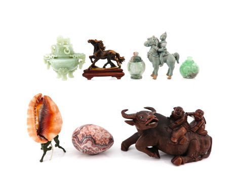 8 pieces, including stone jars with covers, figures, lamp, and carved ox holding Chinese boys measuring 31 x 16 x 20 cm. 