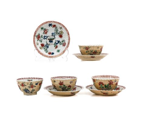 Floral and butterfly decor, 18th Century, saucers are 13 cm. in diameter, chip and hairline.