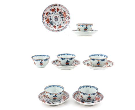 Including 6 cups and 6 saucers, floral decor in iron red, blue and gilt enamels, saucers are 10 cm. in diameter. 