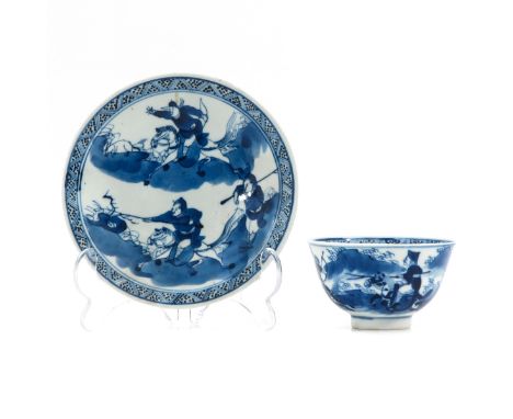Decorated with Chinese hunters on horseback, Kangxi mark, saucers are 13 cm. in diameter. 