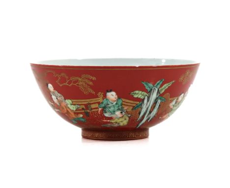 Orange ground decorated with Chinese boys playing garden, Kangxi mark, 20 cm. in diameter, chip.