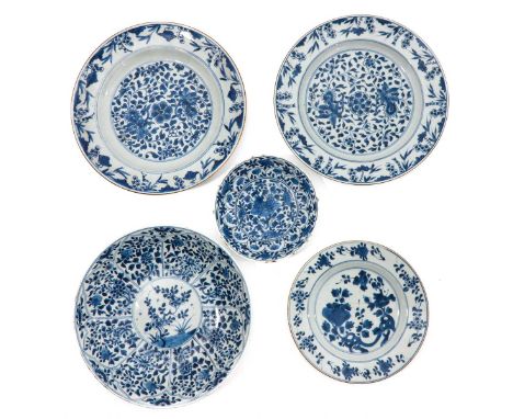 In a variety of blue and white decors and sizes, including Kangxi Period, largest plate is 28 cm., chip and hairline.